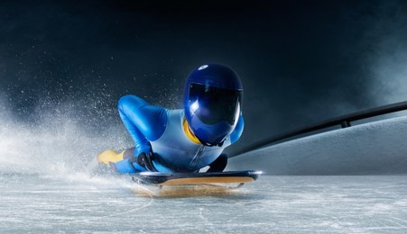 skeleton sport. the athlete descends on a sleigh on an ice track. winter sports