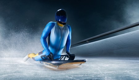 skeleton sport. the athlete descends on a sleigh on an ice track. winter sports