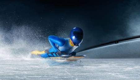 skeleton sport. the athlete descends on a sleigh on an ice track. winter sports