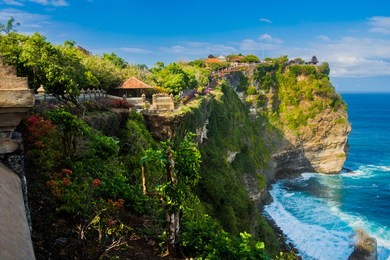uluwatu temple (pura luhur uluwatu) is a balinese hindu sea temple located in uluwatu. it is renowned for its magnificent location, perched on top of a cliff.