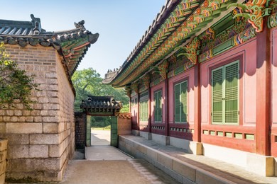 amazing view of scenic gate at changdeokgung palace in seoul, south korea. traditional korean palatial architecture. changdeokgung palace is a popular tourist attraction of asia.
