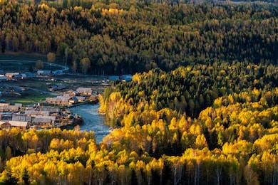 view of hemu village in autumn time, xinjiang, china. the famous village for tourist