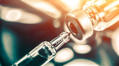 vaccine vial dose flu shot drug needle syringe,medical concept vaccination hypodermic injection treatment disease care hospital prevention immunization illness disease  baby child.blue background 