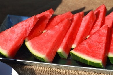 tasty sliced watermelon on table 
