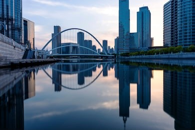 the skyline of the modern city of tianjin, china at nightfall.