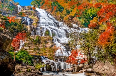 mae ya waterfall with beautiful colorful trees at  doi-inthanon national park, chiang mai province,thailand 