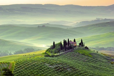 sunrise over the italian countryside - tuscany