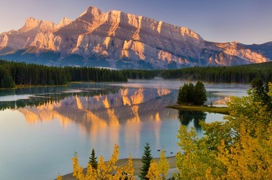 cascade mountain reflecting over two jack lake in banff national park