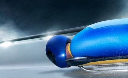 skeleton sport. bobsled. the athlete descends on a sleigh on an ice track.   winter sports