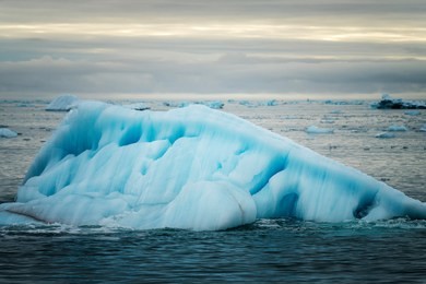 
winter mountain nature svalbard longyearbyen svalbard norway with blue sky and snowy peaks on a sunny day wallpaper during sunset sunrise orange fire.

