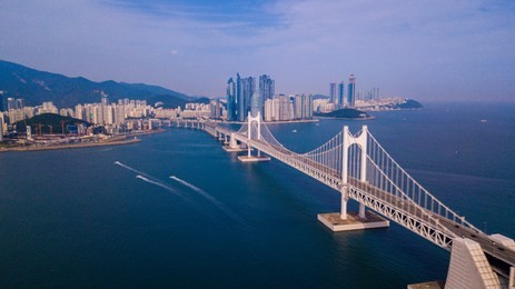 aerial view of gwangan bridge and gwangalli beach in busan city, south korea.