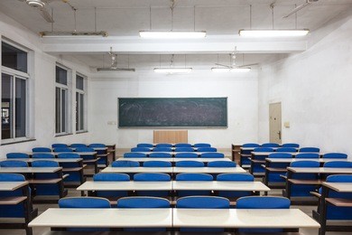 empty classroom with blank blackboard