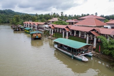 the floating restaurant boats moored up in the central bohol village of loboc.  loboc river cruise in bohol, philippines.