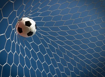 soccer ball in goal, success concept
