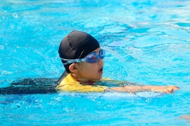 boy practice swimming