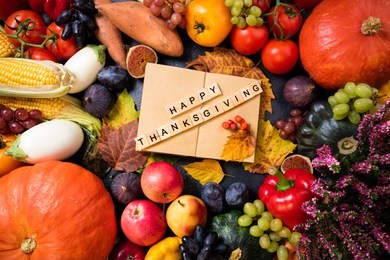 happy thanksgiving day background. autumn fruits vegetables and leaves. thanksgiving concept. top view with copy space