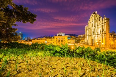 beautiful old architecture building with ruin of st pual church landmark of macau city at twilight night time