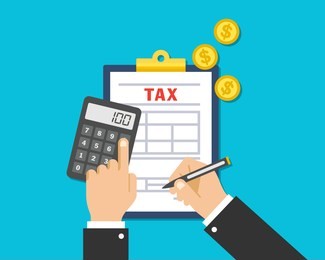 tax auditors are filling out and calculating a tax form for financial businesses