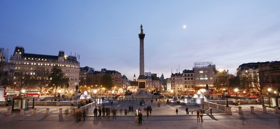 trafalgar square with nelson column at night