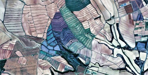 photographic series of abstract landscapes of the fields of spain from the air,