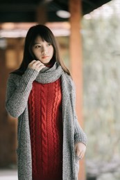 portrait japanese fasion style wool coat fashion dress in japanese garden