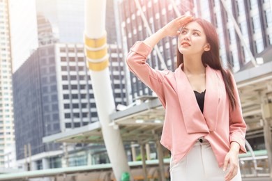 asian office women skin damage from sun uv city air pollution concept