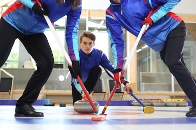 curling. the curling team plays the tournament.