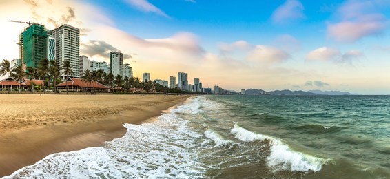 panorama of sunset on a beach at nha trang, vietnam in a summer day