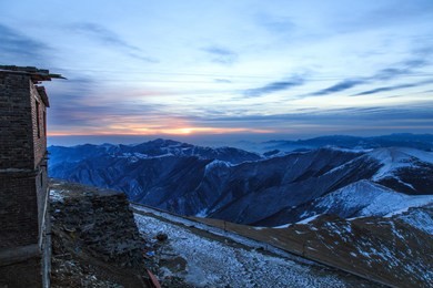 the sun rises early in the morning on mount wutai