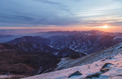 the sun rises early in the morning on mount wutai