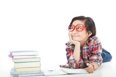 asian little girl  thinking  during preparing homework