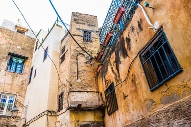 old narrow street of the largest medina in the worlds, unesco, fez, morocco in africa
