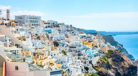 panoramic view of the town of fira in santorini (day)
