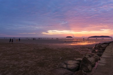 tanjung aru beach, sub-district 
of kota kinabalu in sabah, of malaysia. its main feature is its beach called tanjung aru beach which stretches to over 2 kilometres long along with new skyscrapers. 