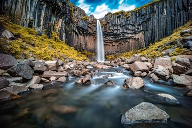 svartifoss is one of the unique waterfalls in south-iceland. it is situated in skaftafell, which belongs to vatnajökull national park. skaftafell is a true oasis after driving through the vast black l