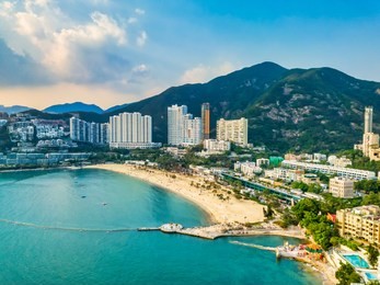 aerial drone flight over repulse bay beach in the southern part of hong kong island,the repulse bay is one of the high end living area in hong kong.