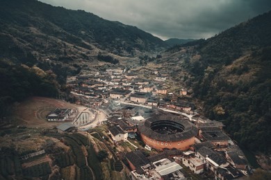 aerial view of tulou, the unique dwellings of hakka in fujian, china.