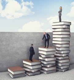 business people on 3d books piles