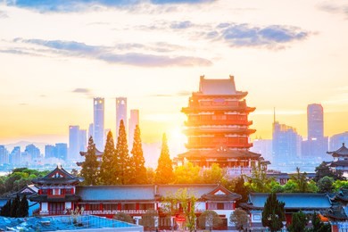 the combination of urban architecture and old architecture in nanchang, china (the chinese character in the ancient building is tengwang pavilion)