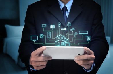 internet of things and smart home concept. controlling everything with a smart phone or gadget using application.