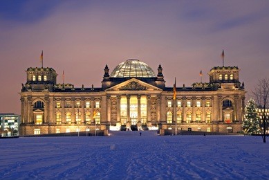 berlin reichstag building in winter with christmas tree