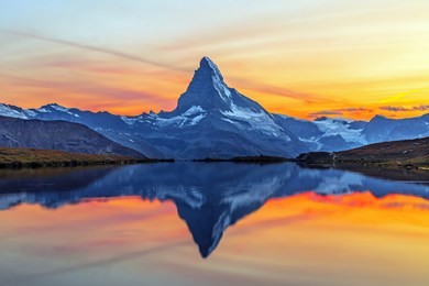 stunning view on mountain matterhorn at morning reflaction in beautiful alpine lake, stellisee, valais region, switzerland, europe