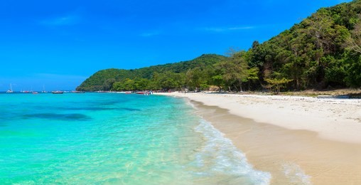panorama of coral (ko he) island near phuket island, thailand in a summer day