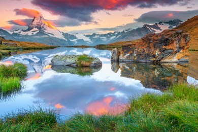 majestic sunrise landscape with famous matterhorn peak and beautiful alpine lake, stellisee, valais region, switzerland, europe