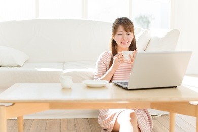 beautiful asian woman using a laptop computer