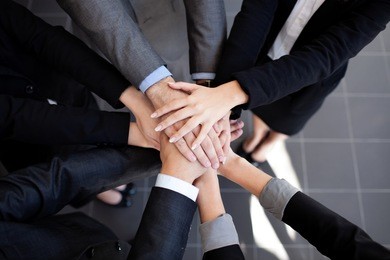 team work concept. business people joining hands.