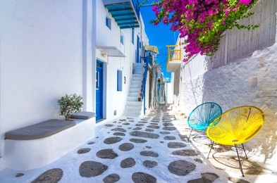 view of the famous pictorial narrow streets of mykonos town in mykonos island, greece