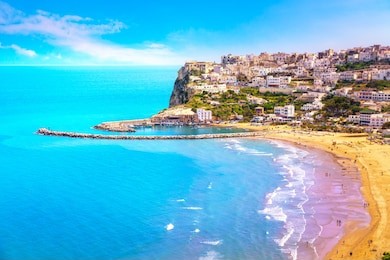 peschici white village and beach, gargano peninsula, apulia, southern italy, europe.