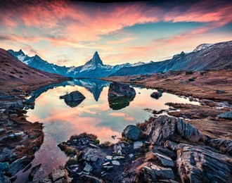 awesome morning view of stellisee lake with matterhorn / cervino peak on background. fantastic autumn scene of swiss alps, zermatt location, switzerland, europe. beauty of nature concept background.