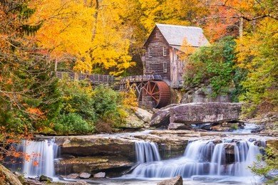 babcock state park, west virginia, usa at glade creek grist mill during autumn season. 